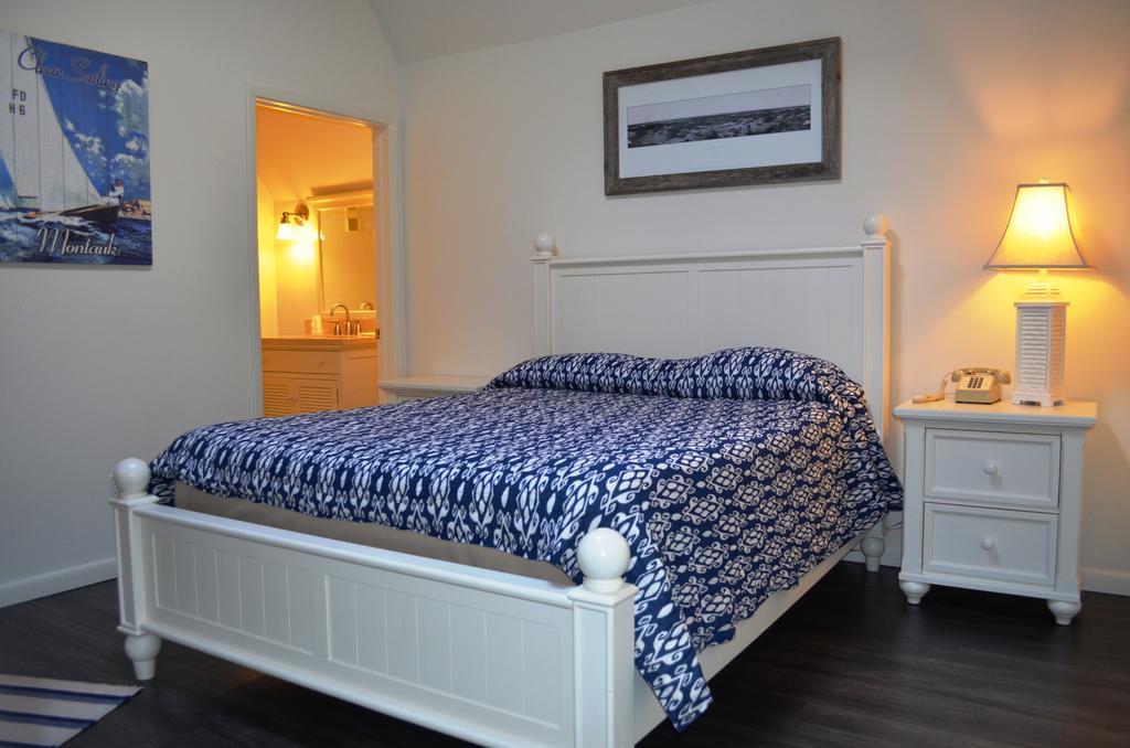 Montauk Manor Hotel Buitenkant foto A bedroom at the Inn at the Opera